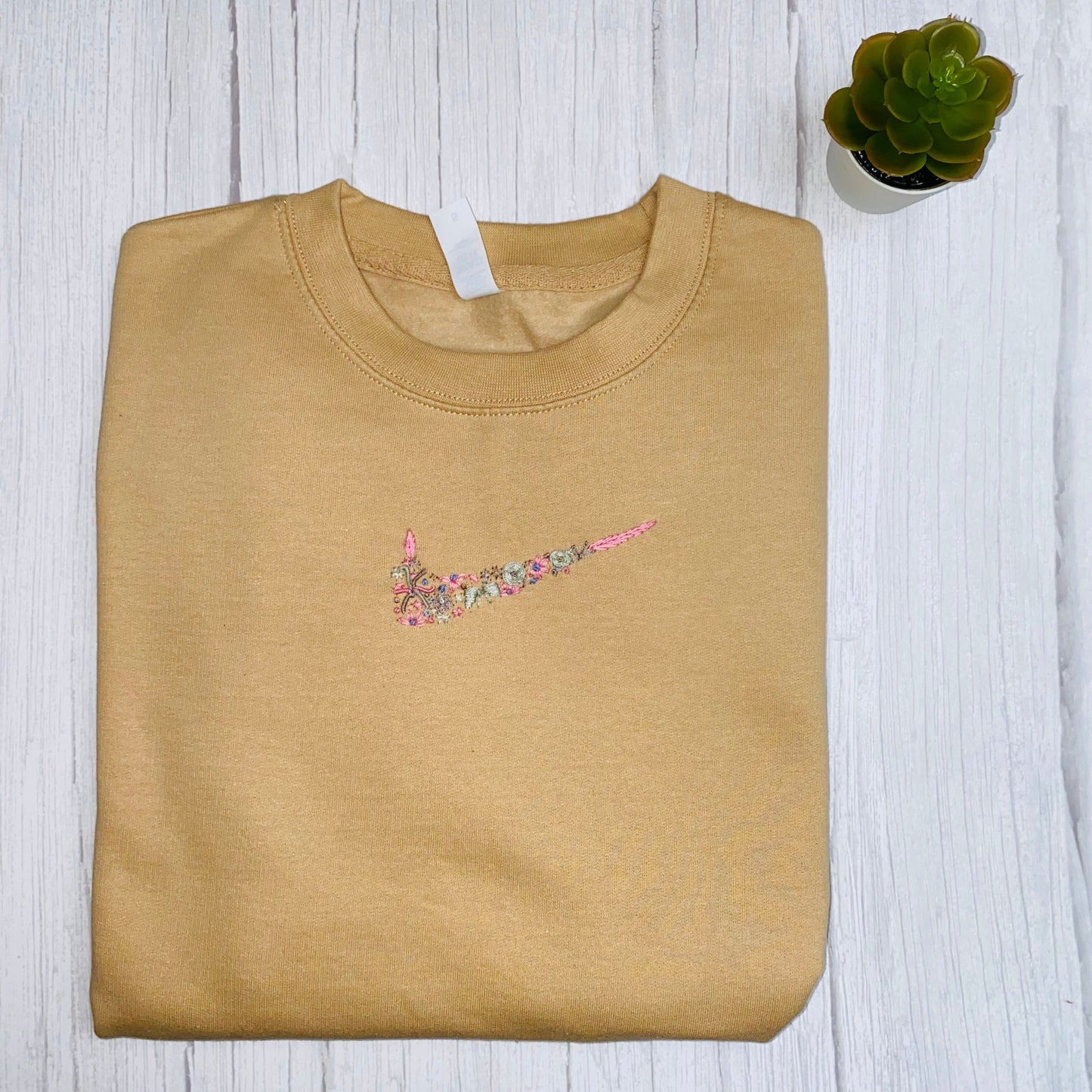 Beautiful Adults hand embroidered floral sweatshirt.