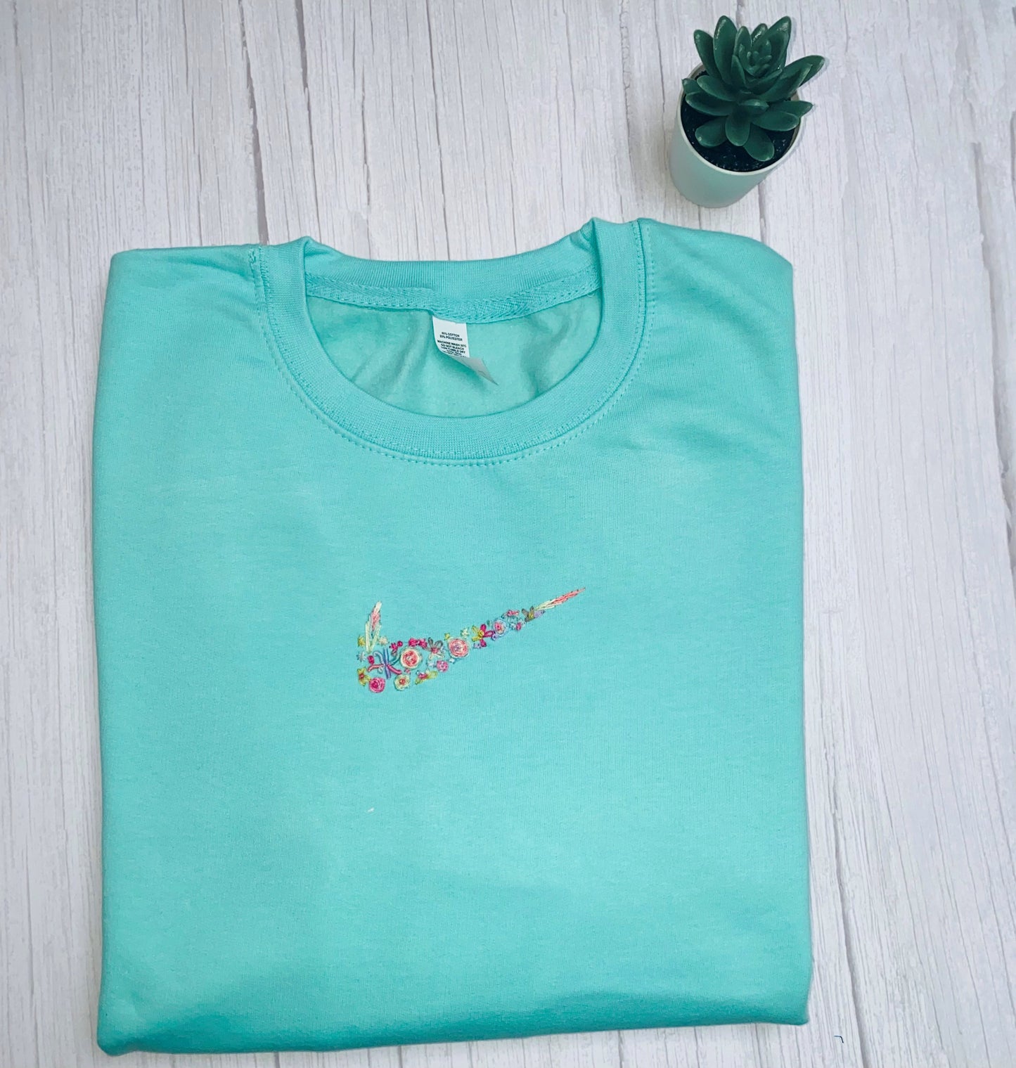 Beautiful Adults hand embroidered floral sweatshirt.